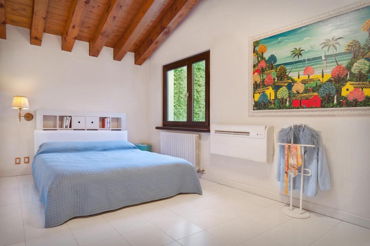 Villa Dismero-Un Oasi Di Lusso E Privacy เบรนโซเน ซูล การ์ดา ภายนอก รูปภาพ